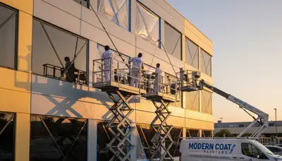 Professional commercial painters applying durable exterior coating in Cape Coral, FL
