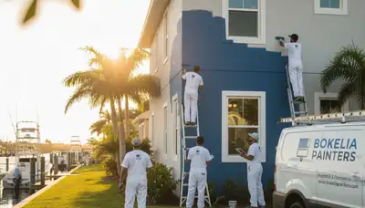 Professional house painters finishing exterior home repaint in Cape Coral, FL