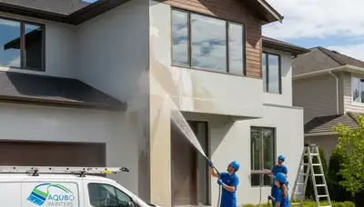 Pressure cleaning home exterior in Cape Coral, FL to remove mold, algae, and restore curb appeal