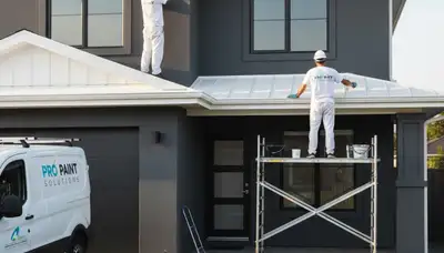 Professional trim and fascia painting on coastal home in Cape Coral FL by expert house painters